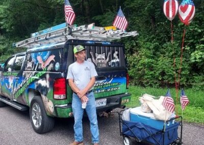 A man standing near the van